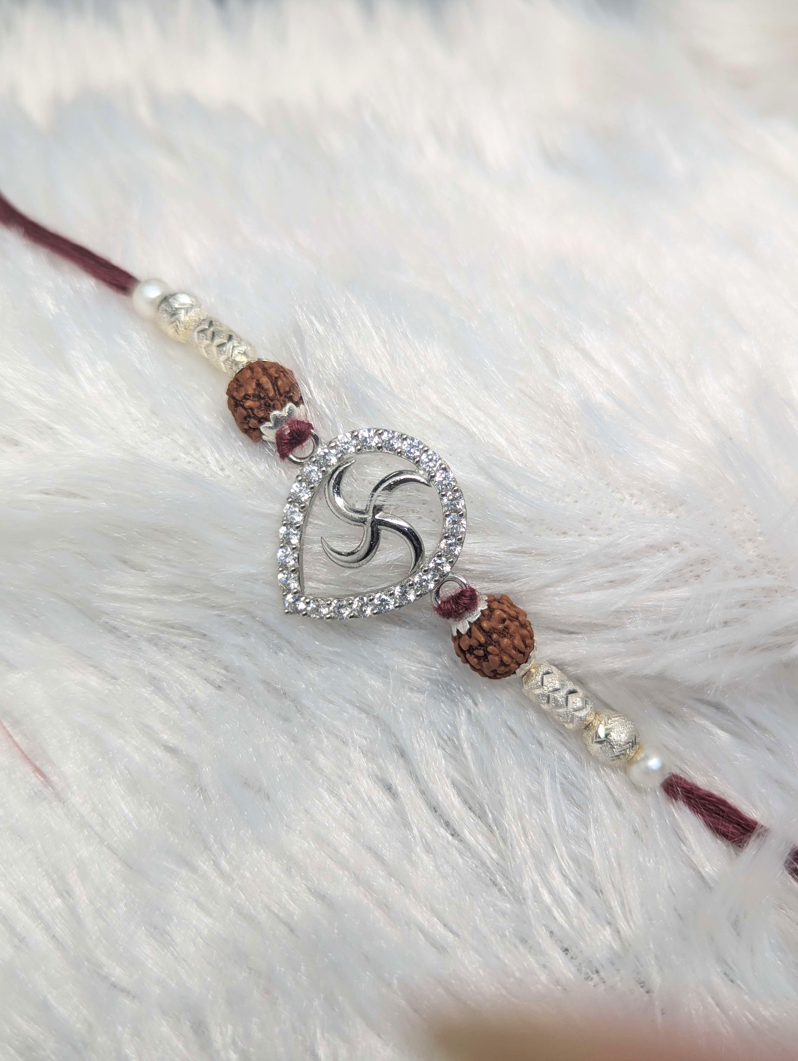 Auspicious Teardrop Swastika & Rudraksha Sterling Silver Rakhi
