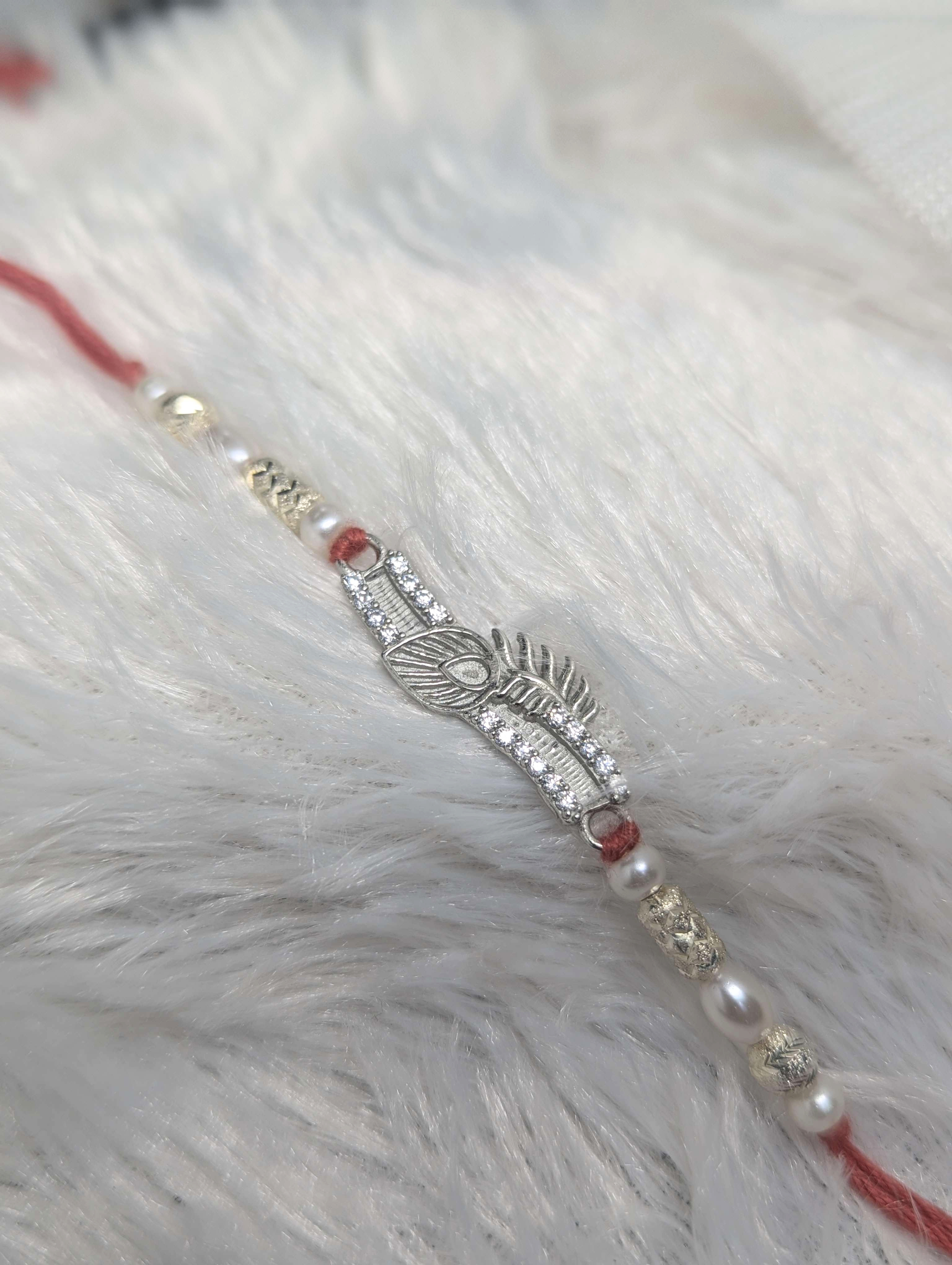 Divine Peacock Feather Sterling Silver Rakhi