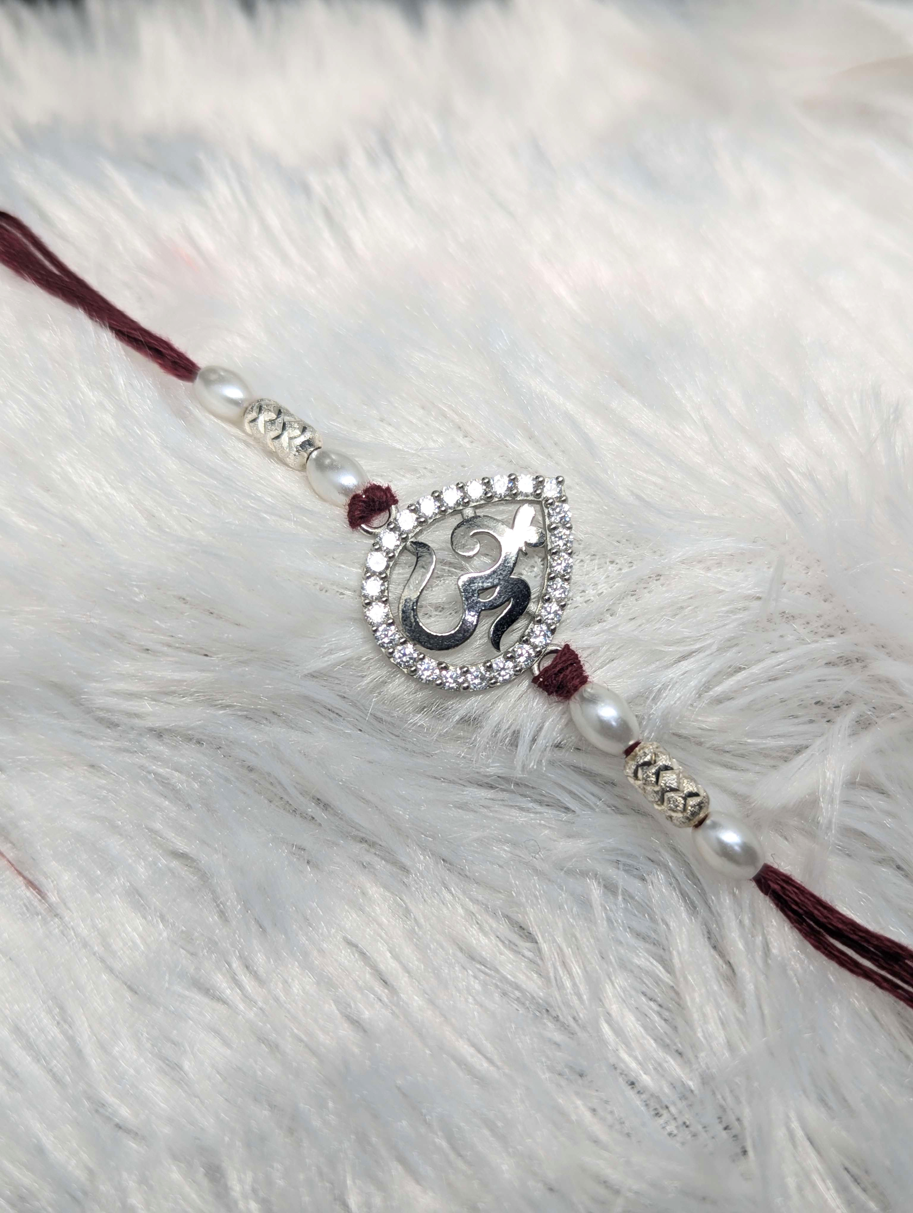 Auspicious Teardrop Om Sterling Silver Rakhi