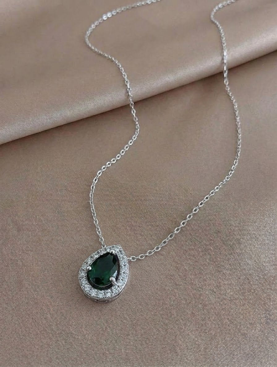 Regal Pear-Cut Emerald Halo Pendant Necklace