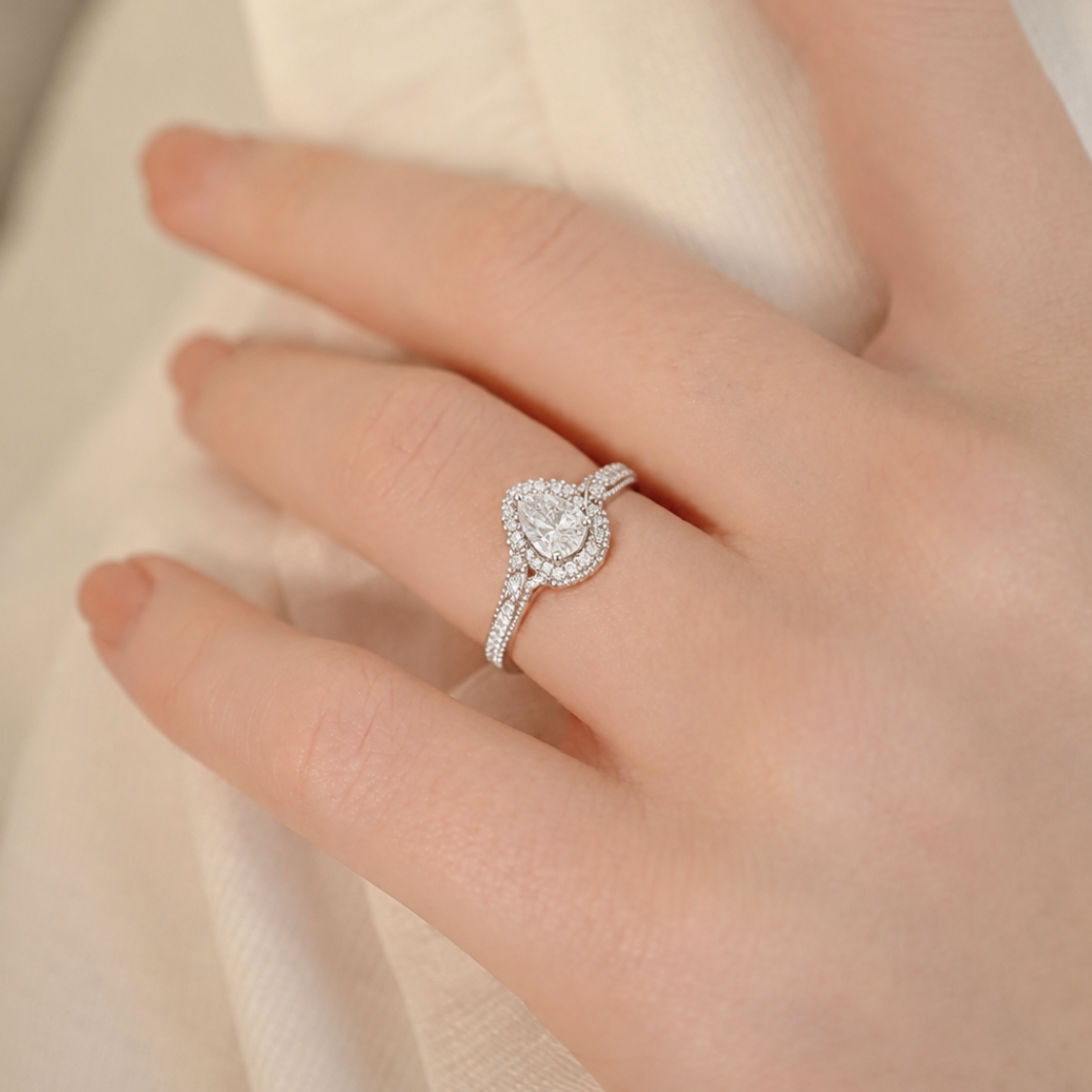 Radiant Pear-Cut Halo Swirl Diamond Ring