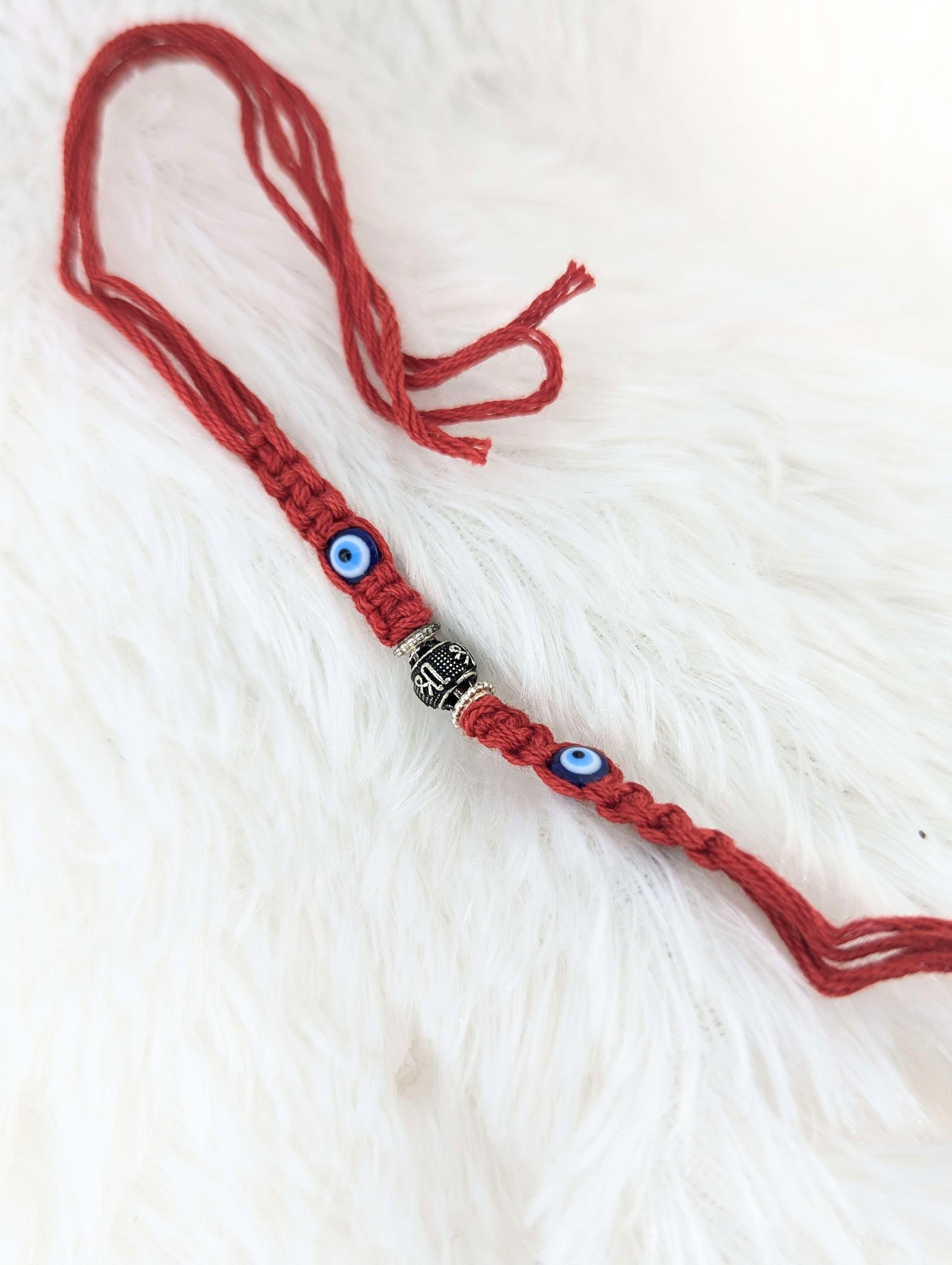 Braided Evil Eye & Om Motif Rakhi