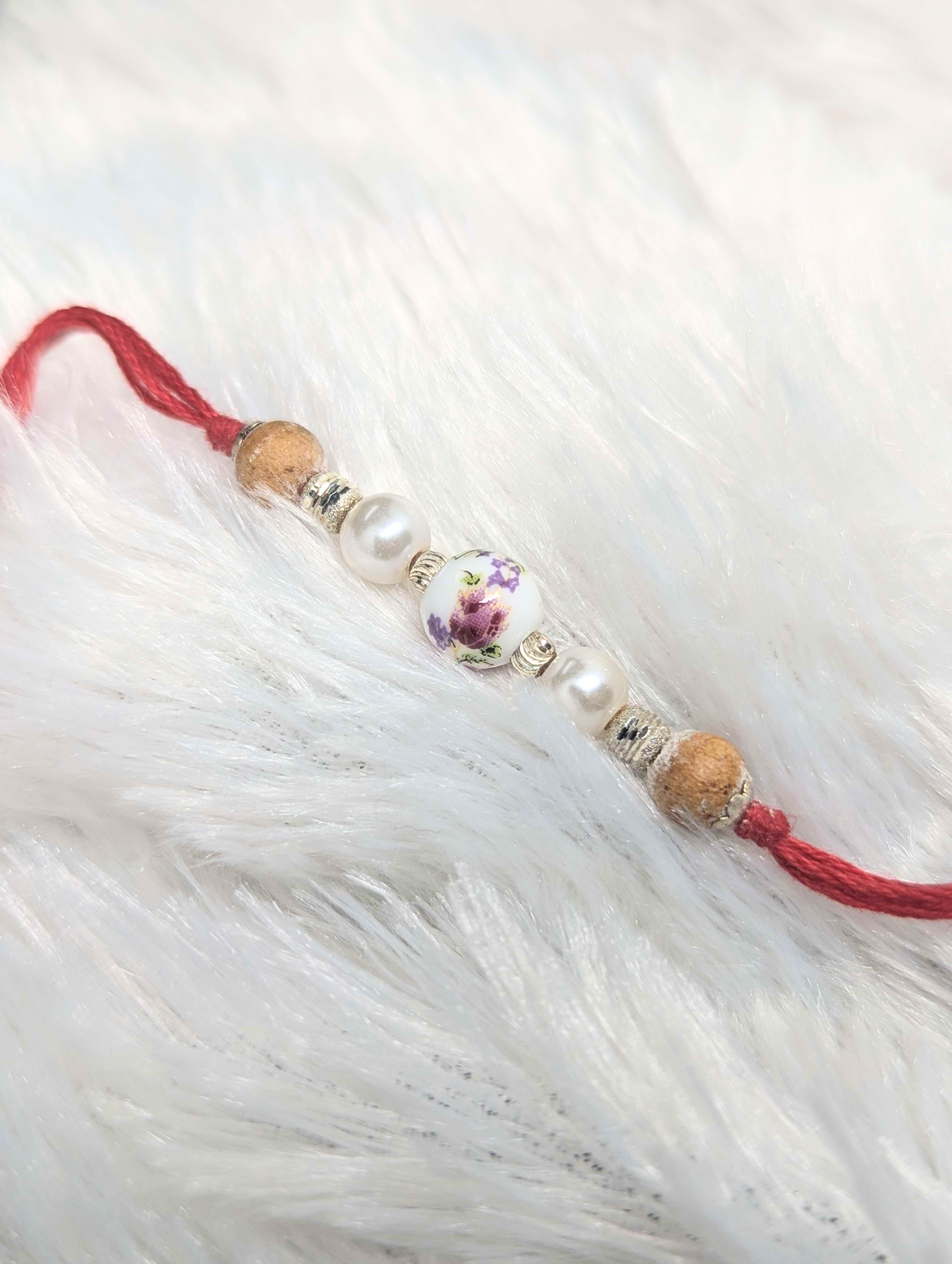 Vintage Floral Pearl & Wooden Bead Rakhi