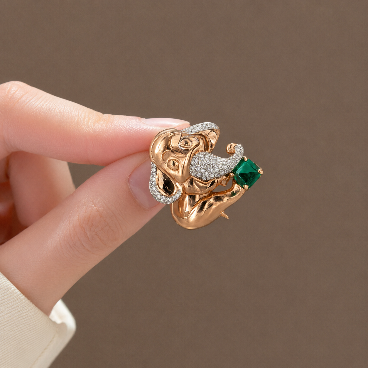 Regal Rose Gold and Emerald Ganesha Brooch