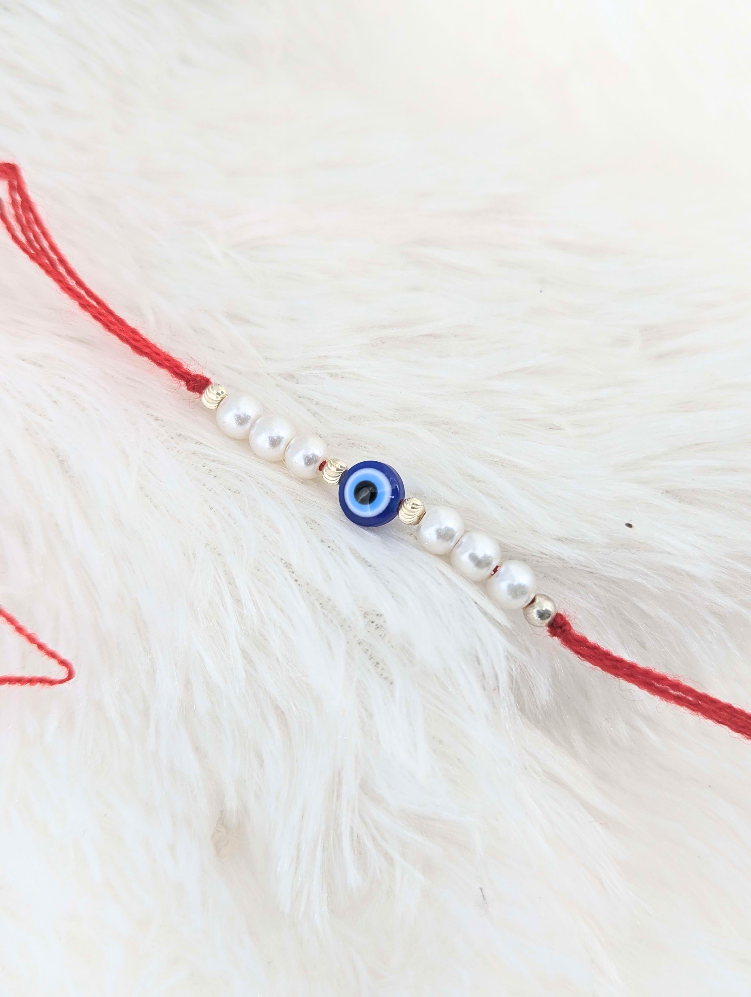 Lustrous Pearl & Evil Eye Protective Rakhi