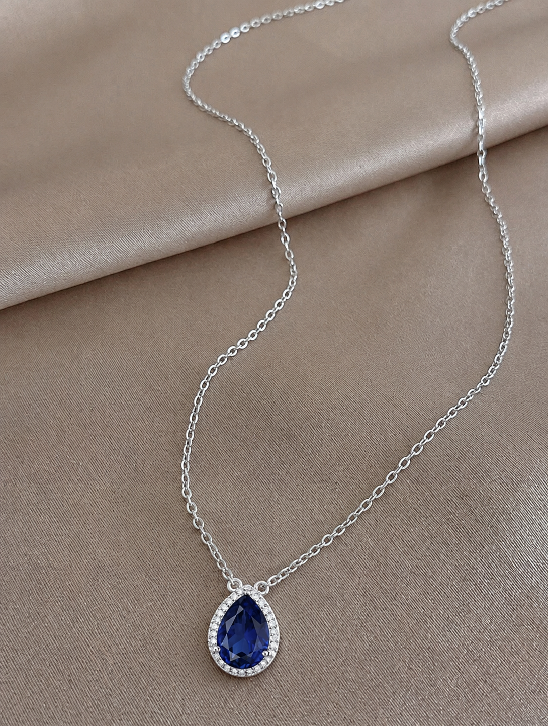 Royal Pear-Cut Sapphire Halo Necklace
