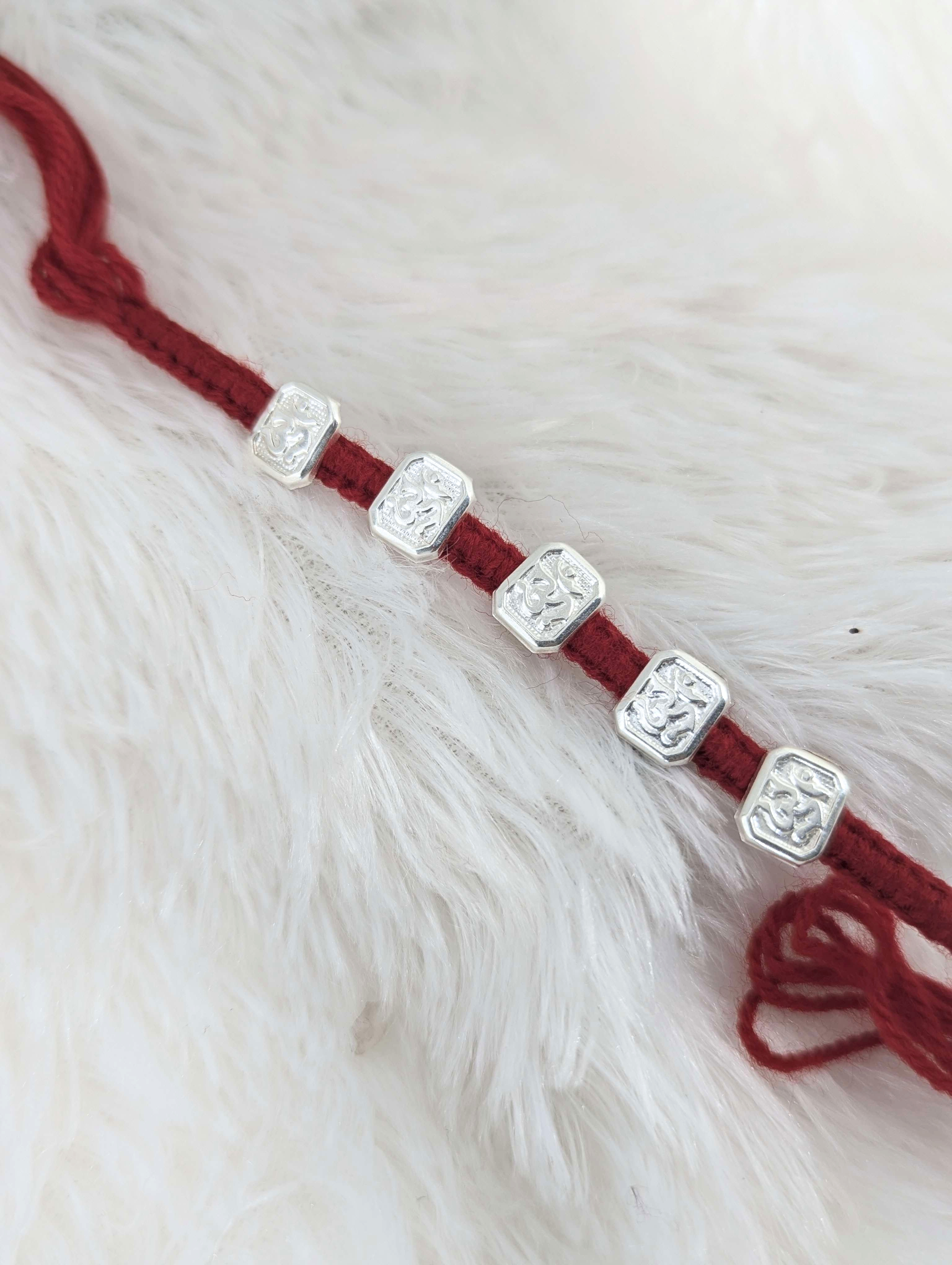 Divine Om Sterling Silver Rakhi
