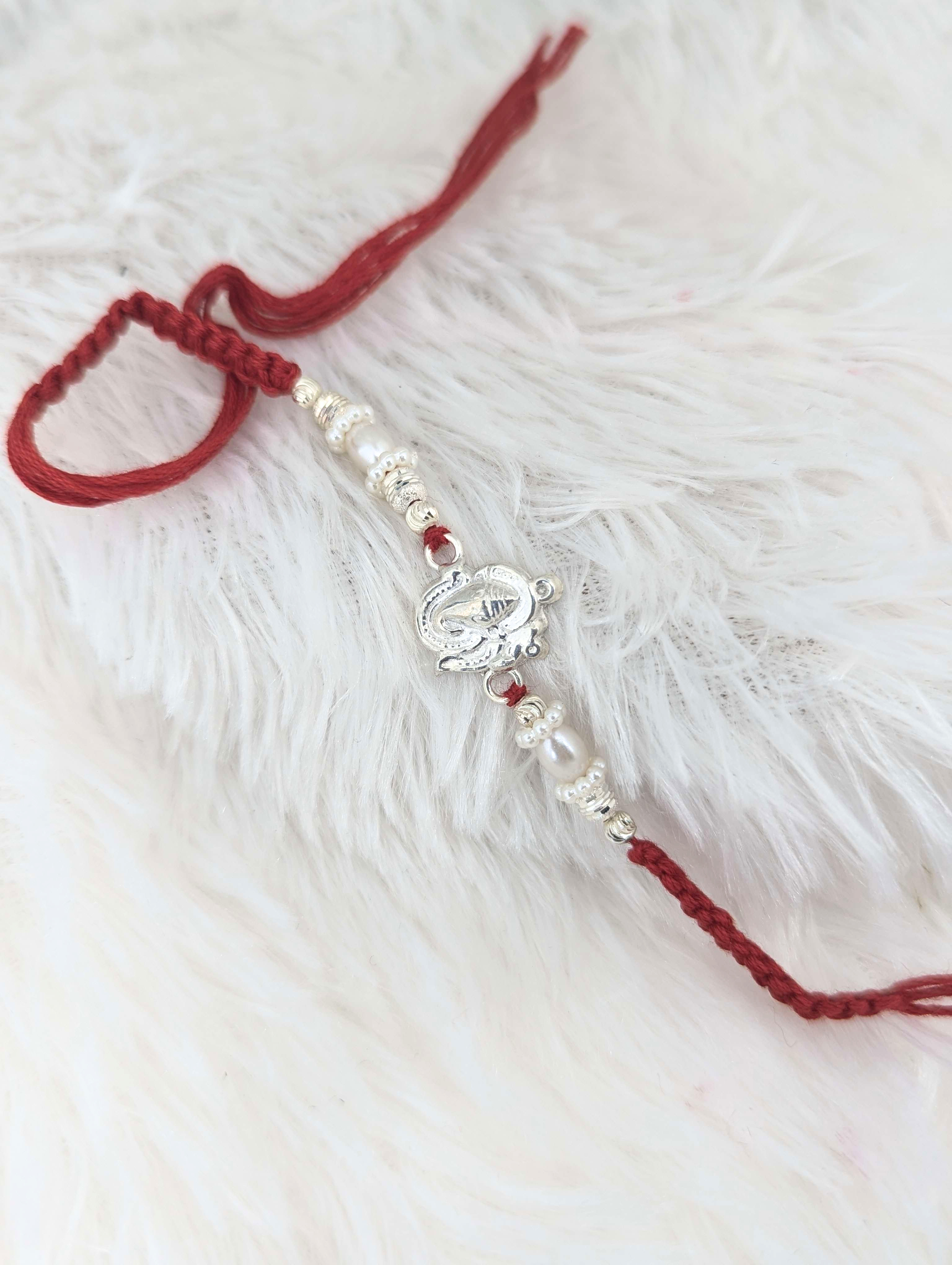 Divine Ganesha Pearl & Sterling Silver Rakhi