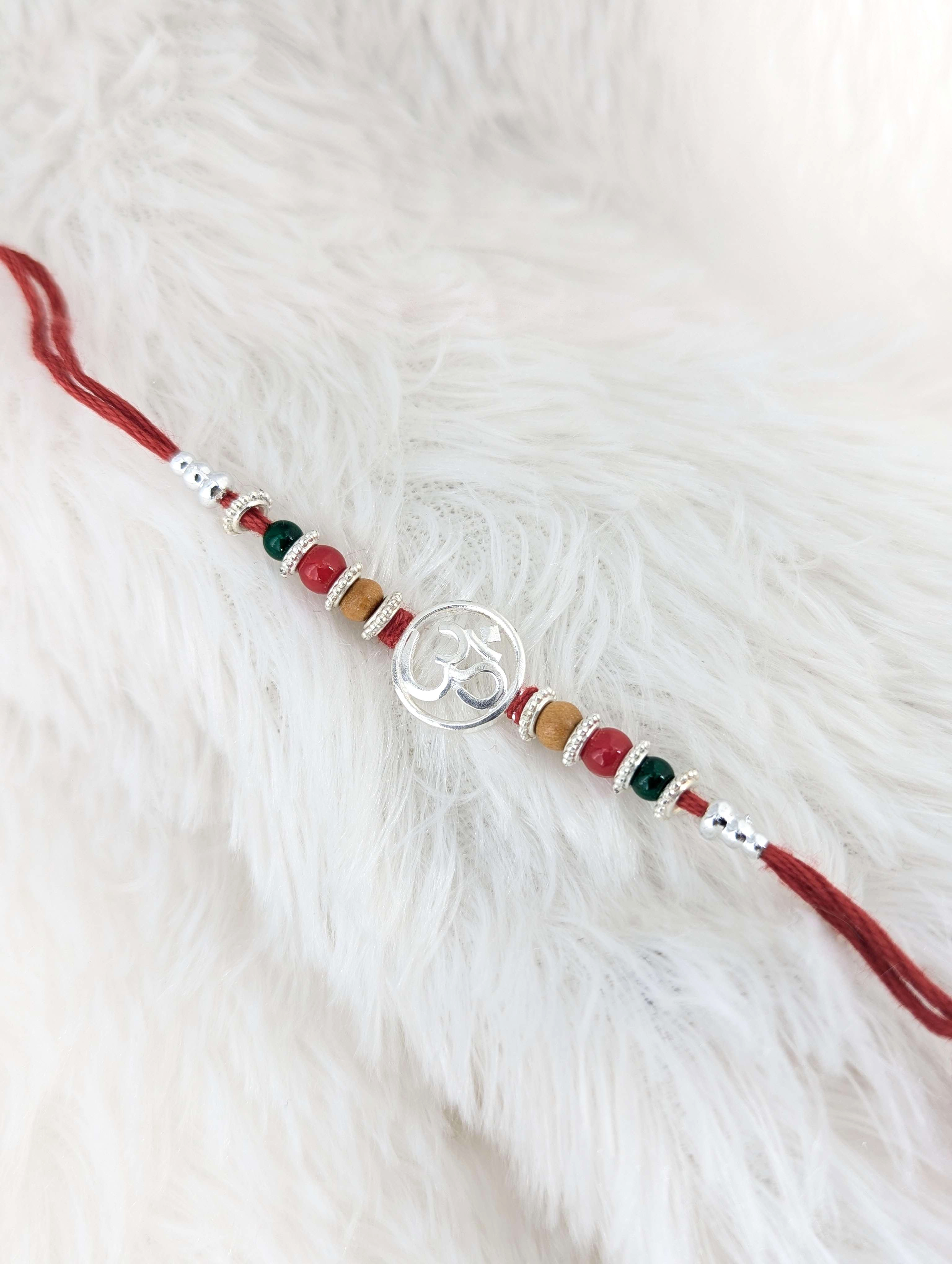 Divine Om Sterling Silver Festive Rakhi