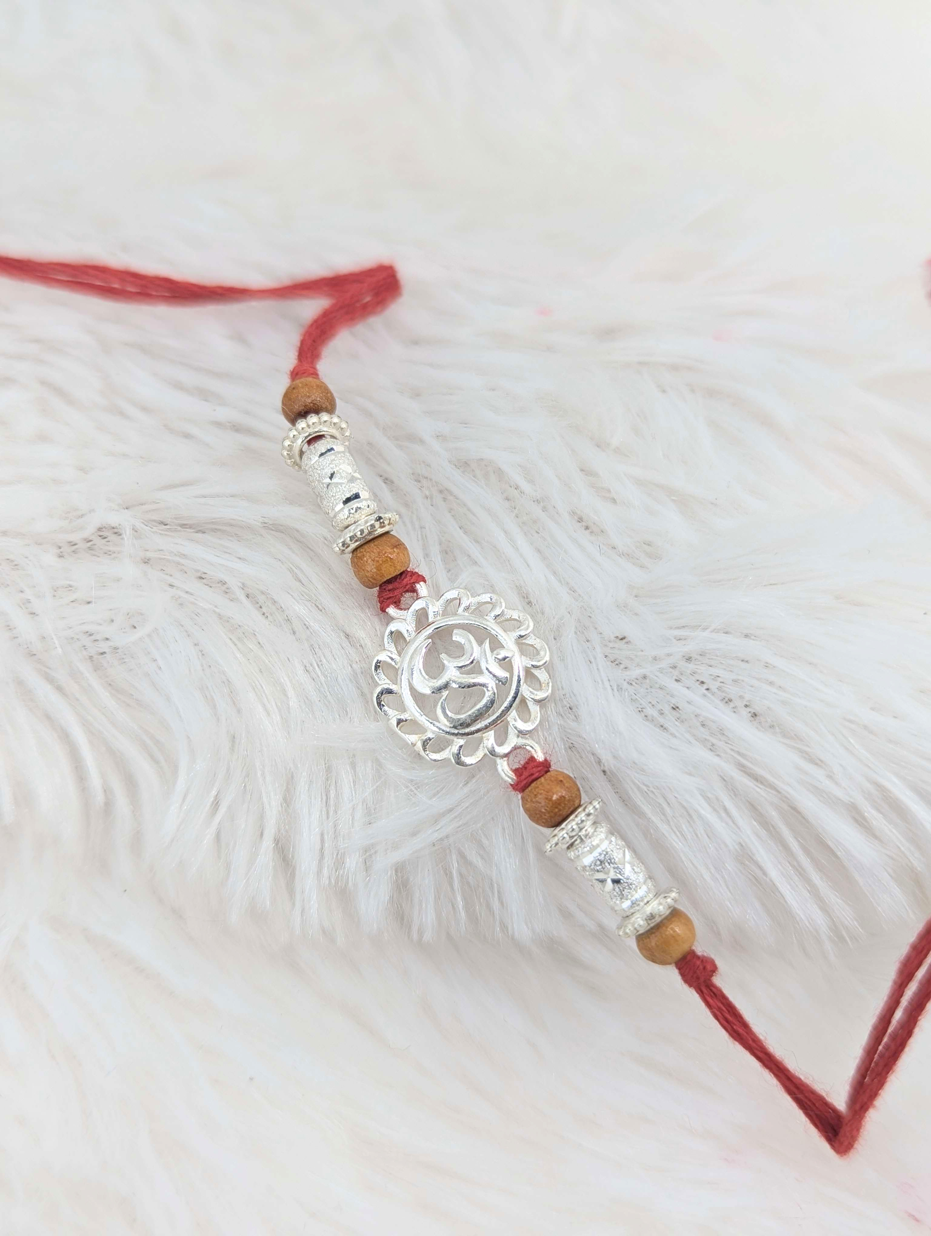 Divine Floral Om Sterling Silver Rakhi