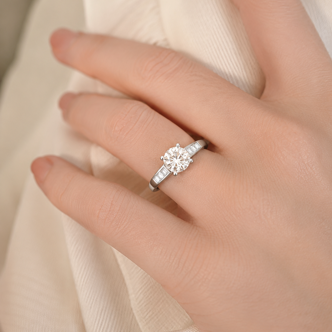 Brilliant Round Solitaire Ring with Channel-Set Baguettes
