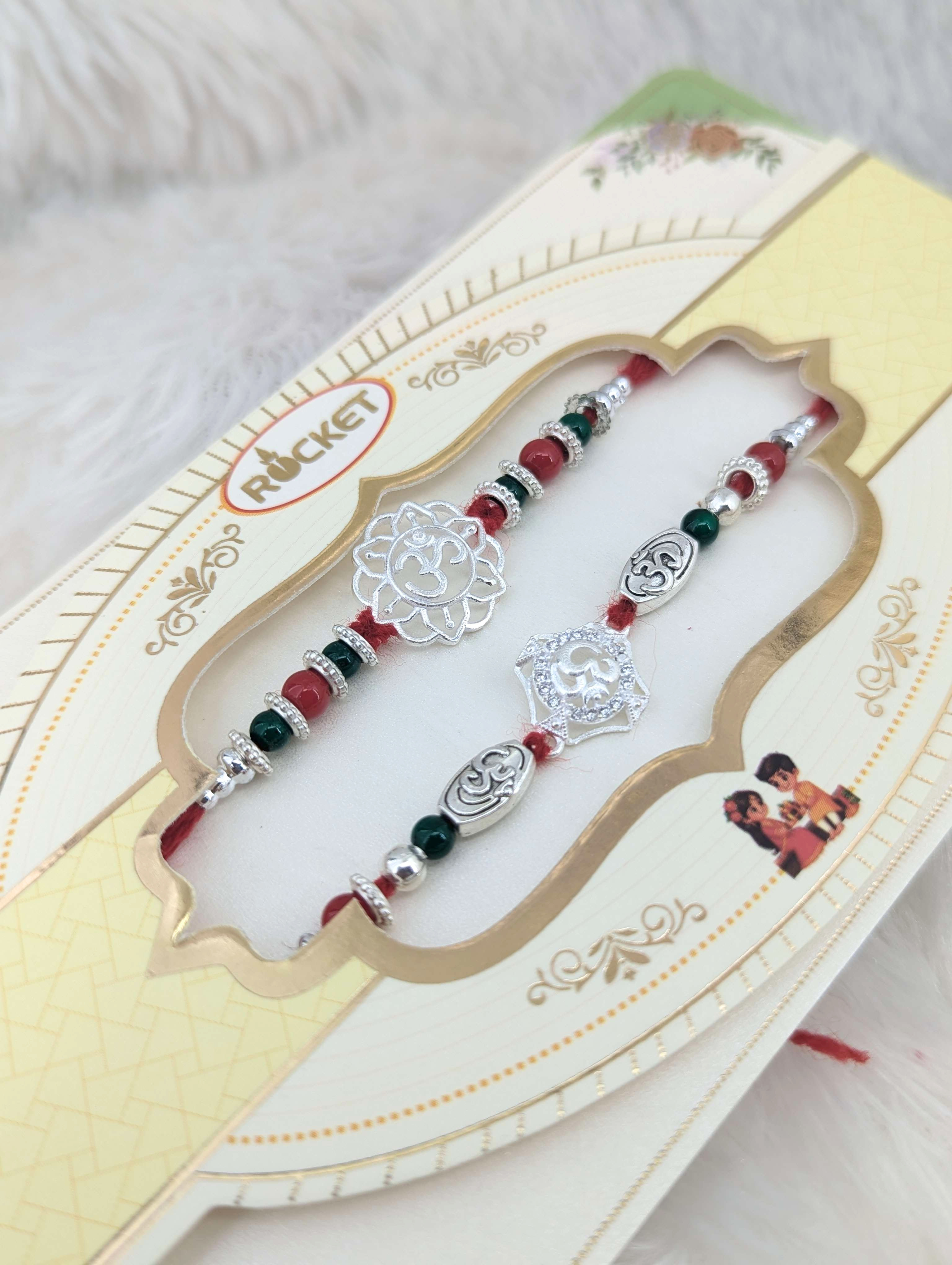 Divine "Om" Sterling Silver Rakhi Duo Set