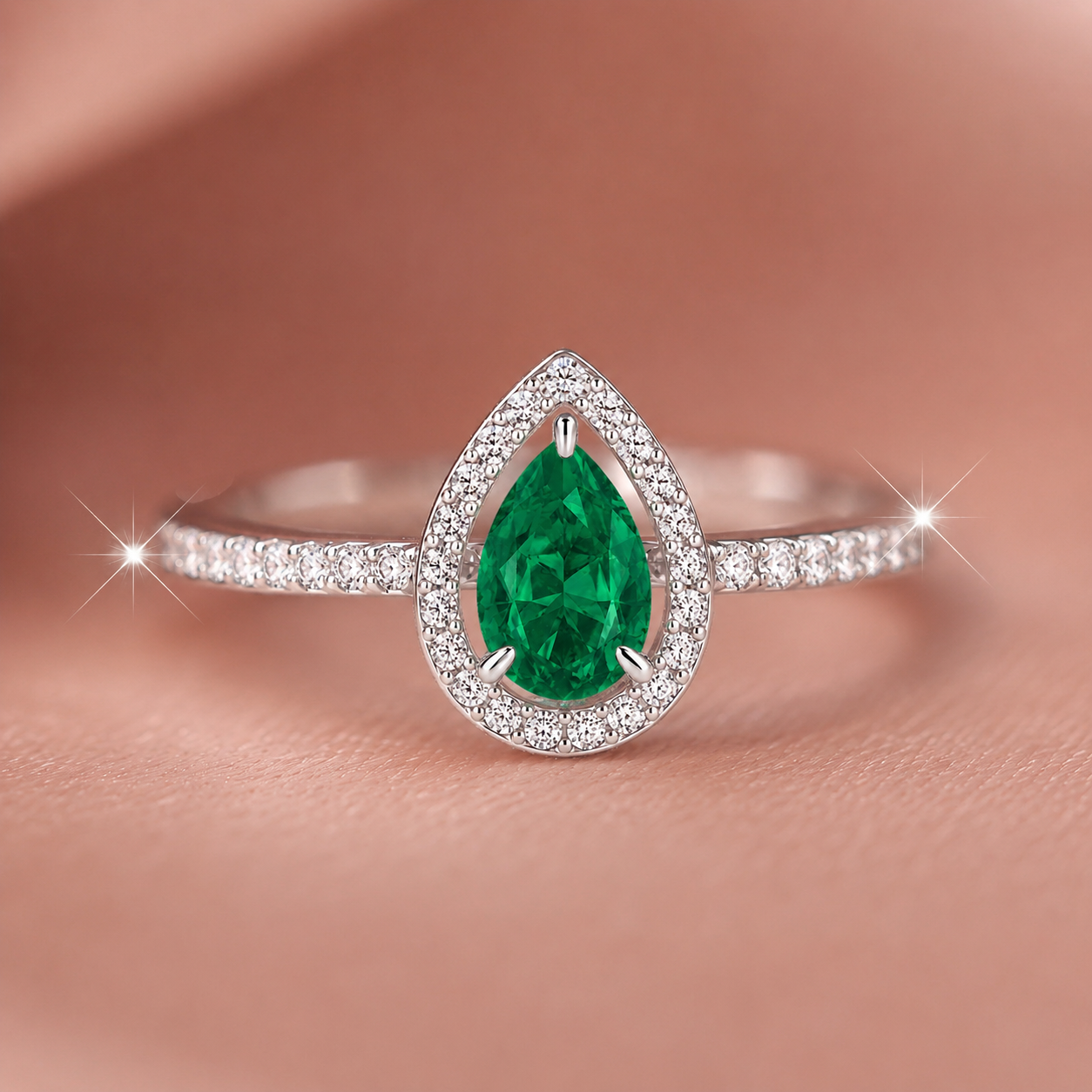 Regal Pear-Cut Emerald Halo Cluster Ring