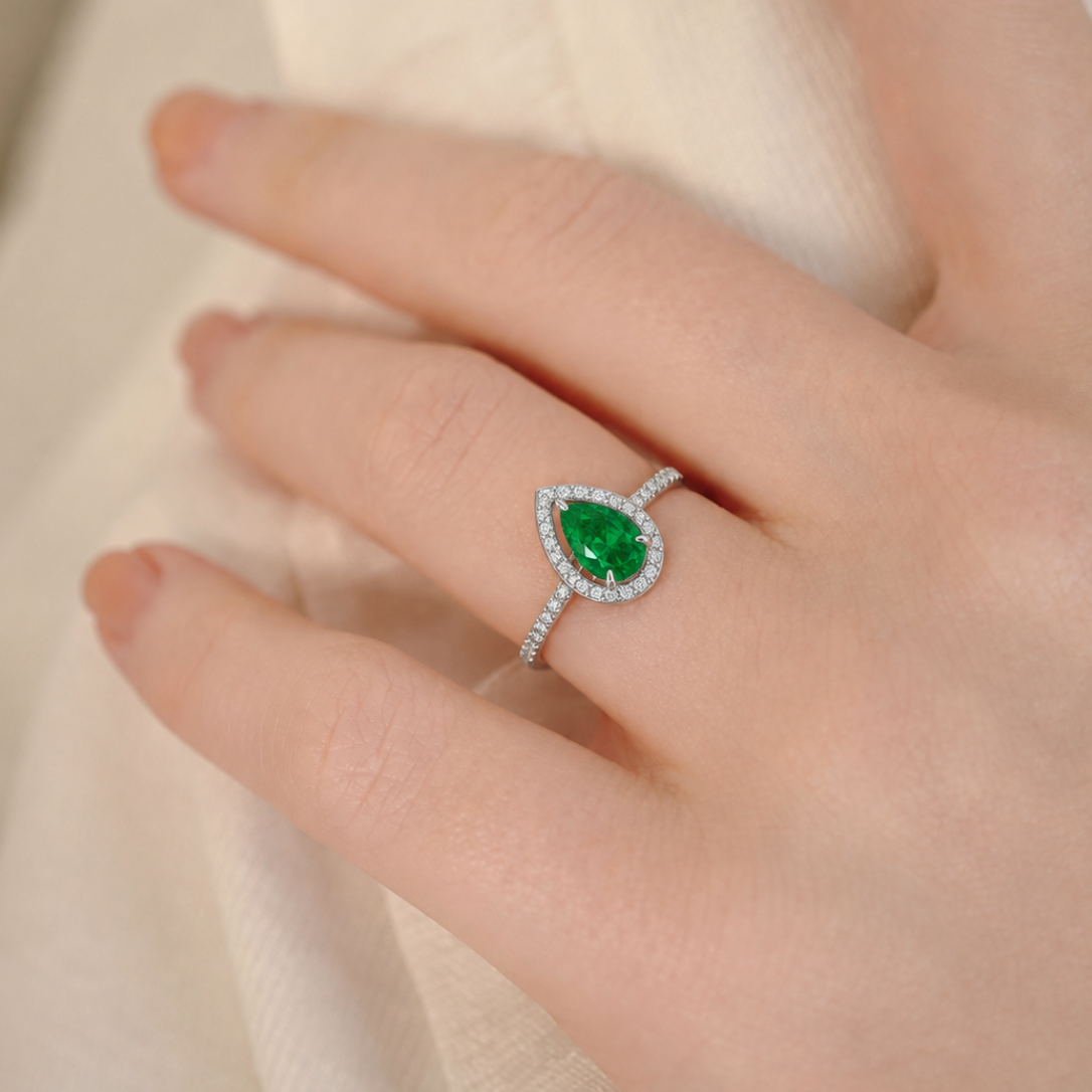 Regal Pear-Cut Emerald Halo Cluster Ring