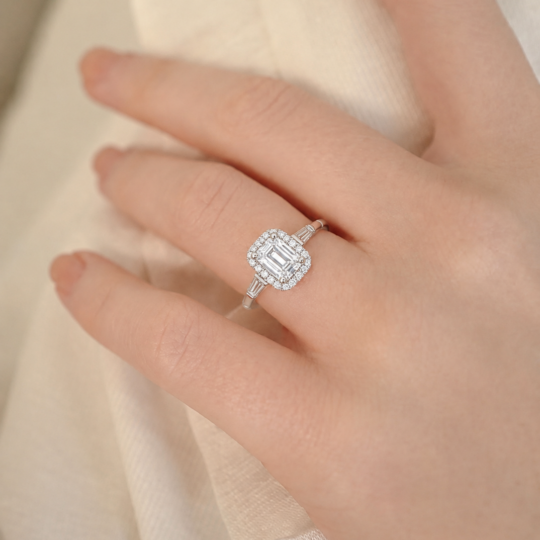Regal Emerald-Cut Halo Ring with Baguette Side Stones