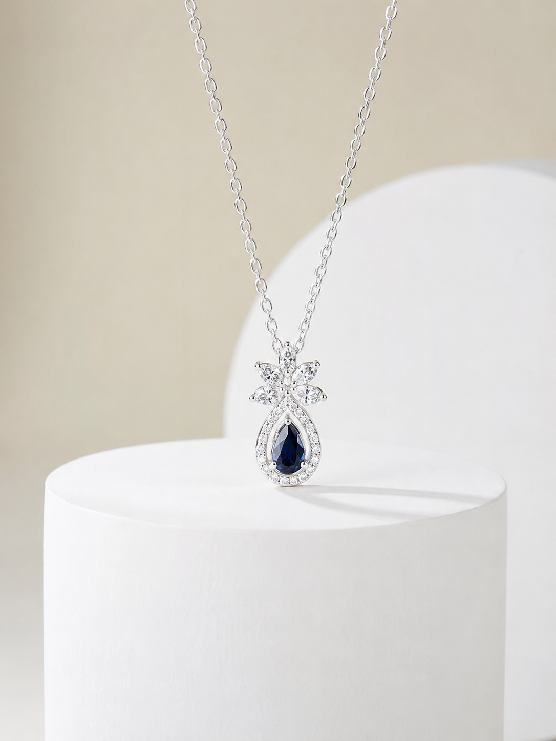 Regal Pear-Shaped Sapphire and Diamond Pendant