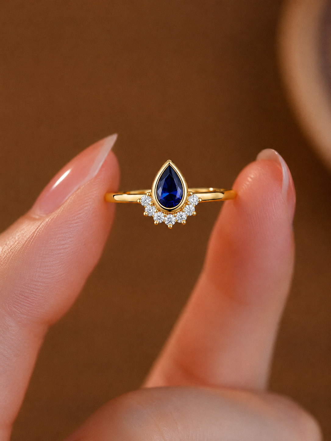 Regal Pear-Cut Sapphire and Diamond Halo Cluster Ring