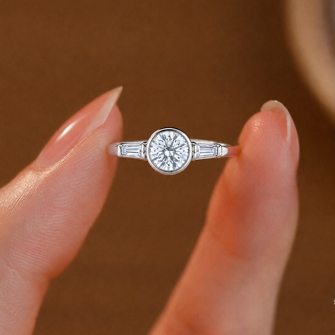 Bezel-Set Round and Baguette Three-Stone Ring