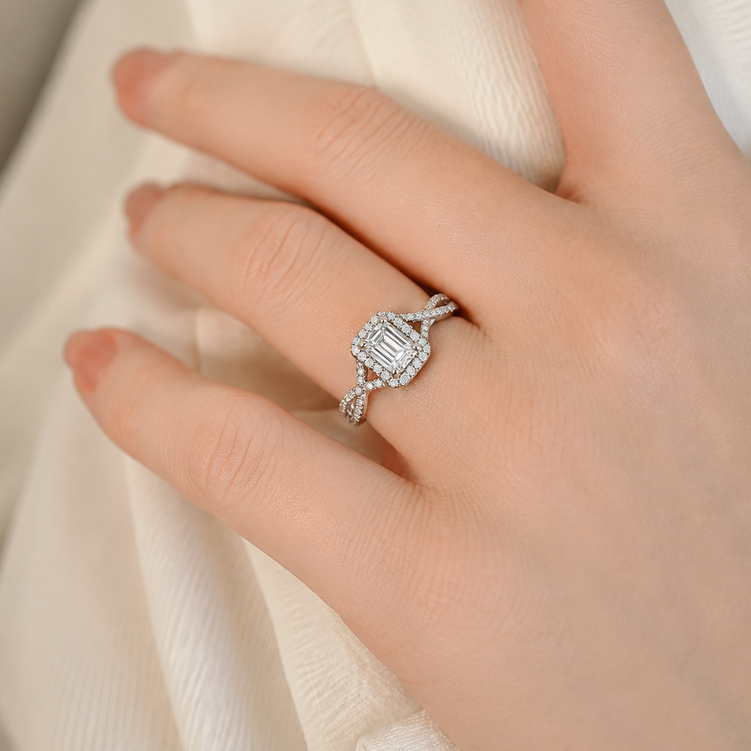 Elegant Emerald-Cut Halo Split-Shank Engagement Ring