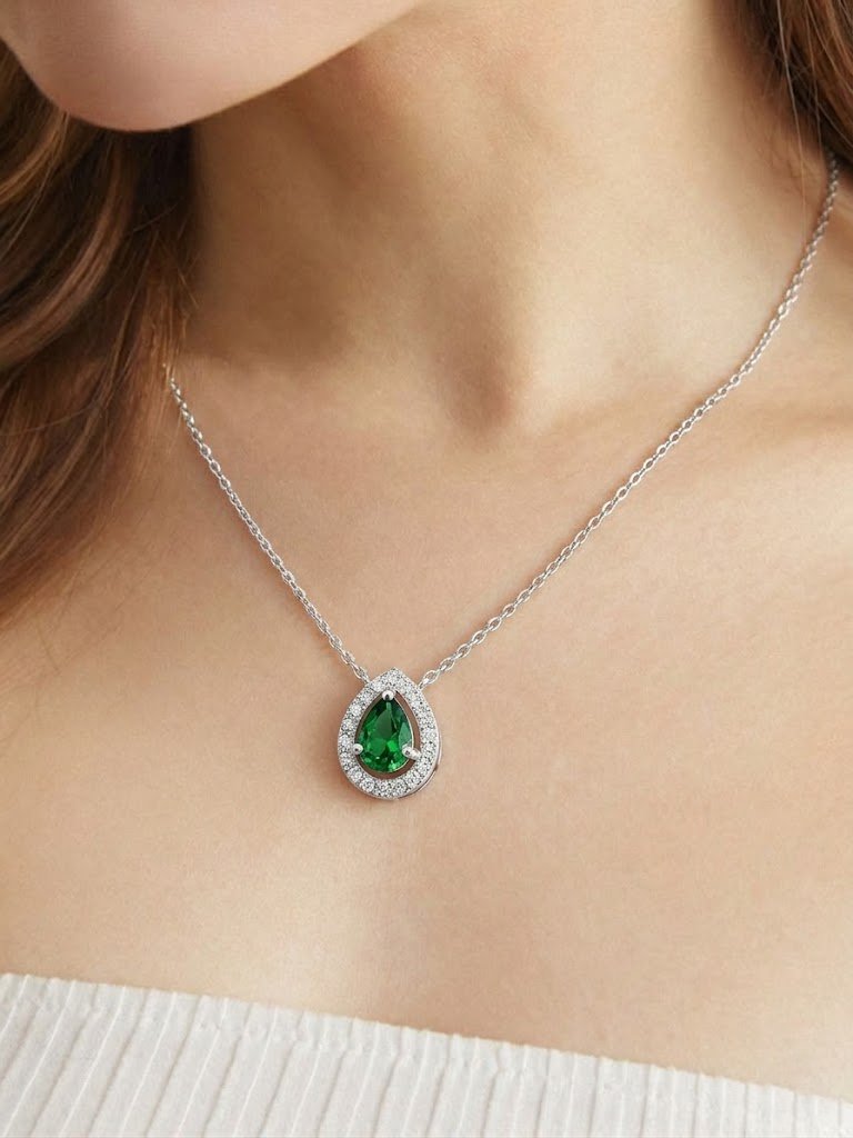 Regal Pear-Cut Emerald Halo Pendant Necklace