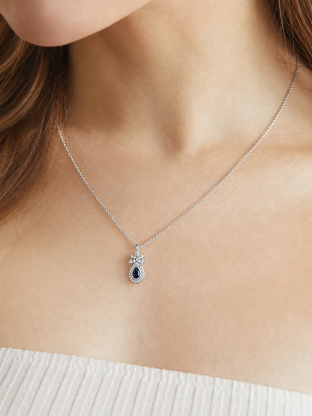 Regal Pear-Shaped Sapphire and Diamond Pendant