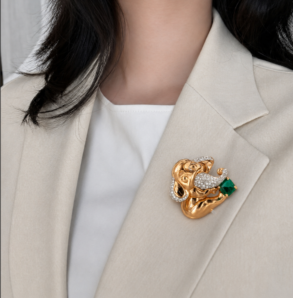 Regal Rose Gold and Emerald Ganesha Brooch